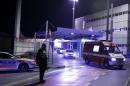 An ambulance carrying Cuban doctor Felix Baez leaves Cointrin airport in Geneva