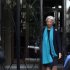 IMF Managing Director Christine Lagarde, leaves her apartment building before appearing in French court, in Paris, Thursday, May 23, 2013. Lagarde is being investigated by a special French court over a controversial arbitrage deal, which she oversaw as French Finance minister in 2008. (AP Photo/Thibault Camus)