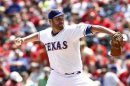 Texas Rangers starting pitcher Lewis pitches against the Toronto Blue Jays in Arlington, Texas