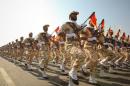 File picture of members of the Iranian revolutionary guard marching at a parade to commemorate anniversary of Iran-Iraq war, in Tehran