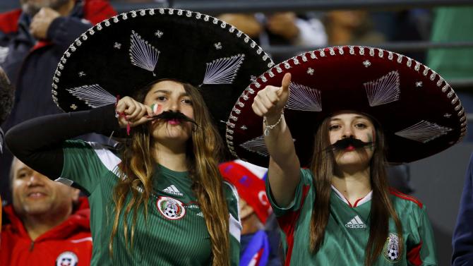 Mexico fans cheer ahead of their team&#39;s first round Copa America 2015 soccer match against Bolivia at Estadio Sausalito in Vina del Mar