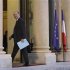 French Economy and Finance Minister Pierre Moscovici arrives at the Elysee Palace in Paris