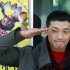 FILE - In this Oct. 11, 2011 file photo, South Korean pop singer Rain gives a military salute to his fans before he enters the army to serve in front of an army training center in Uijeongbu, north of of Seoul, South Korea. Rain is in trouble after paparazzi photos showed him secretly dating a top actress. Seoul’s Defense Ministry said Wednesday, Jan. 2, 2012 it is investigating whether Rain broke military rules by meeting actress Kim Tae-hee while on duty. (AP Photo/ Lee Jin-man, File)