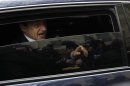 Nicolas Sarkozy, France's President and UMP party candidate for his re-election, leaves after voting in the second round in Paris
