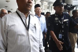 Malaysian Prime Minister Najib Razak, center, arrives&nbsp;&hellip;