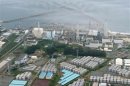 File photo of an aerial view showing TEPCO's tsunami-crippled Fukushima Daiichi nuclear power plant and its contaminated water storage tanks in Fukushima