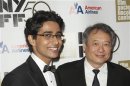 Cast member Sharma and Director Ang attend the opening night gala presentation of film "Life Of Pi" at the 50th New York Film Festival at Alice Tully Hall in New York