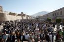 Mourners take part in the funeral of Abdul Qader Helal in Sanaa