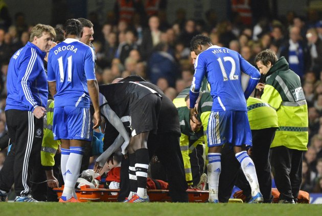 Newcastle United's Tiote is stretchered off during their English Premier League soccer match against Chelsea at Stamford Bridge in London