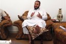 Ismail al-Sallabi, leader of Rafalla al-Sihati brigade, who was injured on Saturday, talks during an interview with Reuters in Benghazi