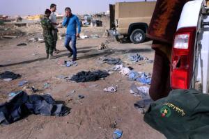 Iraqi military kit litters the ground close to the …