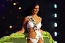 File photo of Miss Universe 2005 contestant Monica Spear of Venezuela, modelling during a swimwear competition in Bangkok