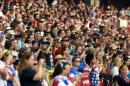 Fans cheer before the start of the Group D match of the 2015 FIFA Women's World Cup between USA and Australia at the Winnipeg Stadium on June 8, 2015, in Winnipeg, Manitoba