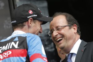 French President Francois Hollande, right, congratulates …