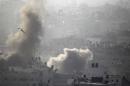 Smoke rises following what witnesses said were Israeli air strikes in Gaza