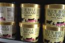 Blue Bell ice cream stands for sale on a grocery store shelf in Lawrence, Kan., Friday, April 10, 2015. (AP Photo/Orlin Wagner)