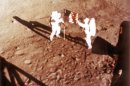 US astronauts Neil Armstrong and "Buzz" Aldrin deploy the US flag on the moon in 1969