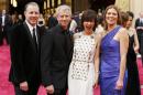 Sanders, DeMicco, Belson, and Hartwell, nominees for best animated feature for their film "The Croods", arrive at the 86th Academy Awards in Hollywood