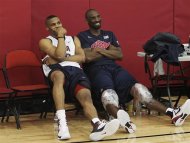 USA men's basketball national team members Russell Westbrook, left, hangs out with teammate Kobe Bryant after practice at the Mendenhall Center on the UNLV campus in Las Vegas on Friday, July 6, 2012. (AP Photo/Las Vegas Review-Journal, Jason Bean)
