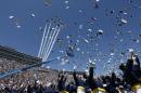 Air Force Academy graduates throw their caps into the air as F-16 jets from the Thunderbirds make a flyover, at the completion of the commencement ceremony for the Air Force Class of 2016, at the U.S. Air Force Academy, in Colorado Springs, Colo., Thursday, June 2, 2016. (AP Photo/Brennan Linsley)