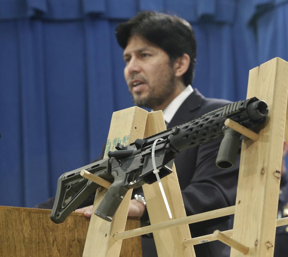 A homemade fully automatic rifle is displayed at a news conference by State Sen. Kevin de Leon, D-Los Angeles, where he unveiled legislation dealing with so called &quot;ghost guns,&quot; at the Capitol in Sacramento, Calif., Monday, Jan. 13, 2014. Under de Leon&#39;s proposed legislation, SB808 would allow the manufacture or assembly of homemade weapons, but require the makers to first apply to the state Department of Justice for a serial number that would be given only after the applicants undergo a background check. De Leon plans to amend the bill to also require that guns contain permanent pieces of metal that could be detected by X-ray machines and metal detectors. .(AP Photo/Rich Pedroncelli)