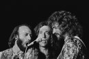 In this Nov, 6, 1979, file photo, the Bee Gees from left, Maurice, Robin and Barry Gibb sing close into the microphone at a Miami Beach concert in Miami. November 6, 1979. A representative said on Sunday, May 20, 2012, that Robin Gibb has died. He was 62. (AP Photo/Phil Sandlin, File)