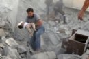 In this image taken from video obtained from Shaam News Network (SNN), which has been authenticated based on its contents and other AP reporting, a young child is rescued from the rubble of a building destroyed by government airstrike in Azaz, Syria, Friday, Sept. 28, 2012. A Syrian activist group, the Local Coordination Committees, said a Syrian warplane bombed the northern town of Azaz near the Turkish border, killing several people. (AP Photo/Shaam News Network SNN via AP video)