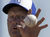 FILE - In this Feb. 16, 2013 file photo, Kansas City Royals Hall of Famer George Brett catches a ball as he bats to infielders during a spring training baseball workout in Surprise, Ariz. Brett has been appointed the Kansas City Royals' interim hitting coach as part of a shakeup aimed at pulling the struggling team out of its skid. The team announced the move before Thursday night's, May 30, 2013 game in St. Louis. (AP Photo/Charlie Riedel, File)