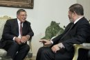 Egypt's newly elected President Mohammed Morsi, right, meets with US defense Secretary Leon Panetta in Cairo, Egypt, Tuesday, July 31, 2012. Panetta is seeking assurances from Egypt's new Islamist government that the country will remain a military partner at a time of political tumult in the Middle East and growing worry about Iran's nuclear ambitions. (AP Photo/Amr Nabil)
