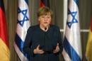 German Chancellor Merkel speaks during her meeting with Israeli Prime Minister Netanyahu in Jerusalem