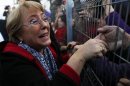 Former Chilean president and former executive director of gender equality body U.N. Women Michelle Bachelet is welcomed by her supporters upon her arrival at Santiago airport