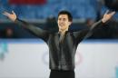 Patrick Chan of Canada acknowledges the crowd after completing his routine in the men's short program figure skating competition at the Iceberg Skating Palace during the 2014 Winter Olympics, Thursday, Feb. 13, 2014, in Sochi, Russia. (AP Photo/Ivan Sekretarev)