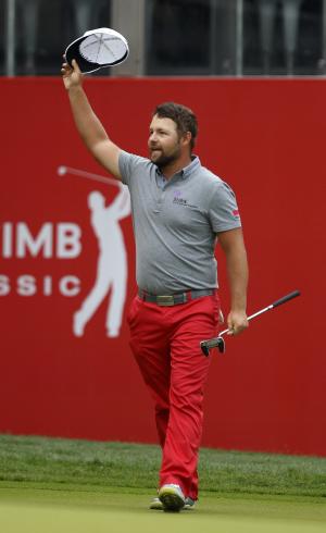 Moore wins CIMB Classic in playoff