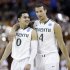 Miami's Shane Larkin (0) and Trey McKinney Jones (4) chat during a break in the second half of a third-round game of the NCAA college basketball tournament against the Illinois Sunday, March 24, 2013, in Austin, Texas. (AP Photo/David J. Phillip)