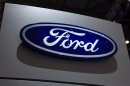 A Ford logo is seen on the car maker's booth during the first media day of the Geneva Auto Show at the Palexpo in Geneva
