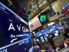 A screen displays the price for Avon Products Inc. at the post that trades the stock on the floor of the New York Stock Exchange