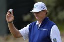 Ernie Els of South Africa acknowledges the crowd during the first round of the British Open golf Championship at Muirfield in Scotland