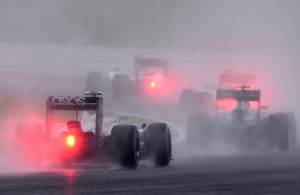 Drivers speed under heavy rain at the Japanese Grand&nbsp;&hellip;