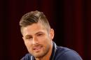 France's Olivier Giroud answers journalists' questions during a press conference at the Teatro Pedro II, in Ribeirao Preto, Brazil, Tuesday, June 10, 2014. France will face Ecuador, Switzerland and Honduras in group E of the World Cup. (AP Photo/David Vincent)