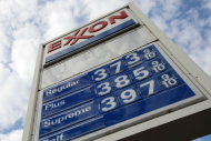FILE - This Feb. 27, 2012, file photo shows gas prices at a Pittsburgh Exxon mini-mart. Exxon Mobil Corp. reports quarterly financial results before the market open on Thursday, Oct. 31, 2013. (AP Photo/Gene J. Puskar, File)