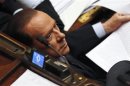 Former Italian Prime Minister Berlusconi looks on during a vote of confidence at the Lower House of Parliament in Rome