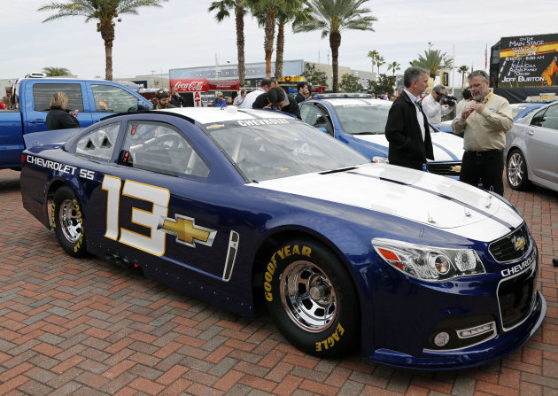 <p>               The new Chevrolet SS racing is displayed at Daytona International Speedway, Saturday, Feb. 16, 2013, in Daytona Beach, Fla. Chevrolet might have pulled out of NASCAR had the sanctioning body not agreed to redesign race cars and make them more relevant to consumers. NASCAR President Mike Helton and Hendrick Motorsports owner Rick Hendrick said Saturday that they had talks with the American automaker that made it clear things needed to change to keep Chevrolet happy. But Mark Reuss, president of General Motors North America, said the auto giant never threatened to walk. (AP Photo/Terry Renna)