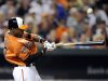 Baltimore Orioles' Adam Jones (10) breaks his bat as he pops out during the third inning of a baseball game against the New York Yankees, Saturday, Sept. 8, 2012, in Baltimore. (AP Photo/Nick Wass)