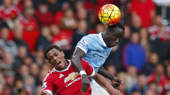 Manchester City&#39;s Bacary Sagna and Manchester United&#39;s Anthony Martial in action