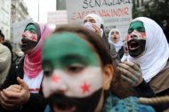 مقتل 10 اشخاص وتظاهرات في سوريا والمعارضة تبدا اجتماعاتها في تونس Photo_1324043595609-1-0