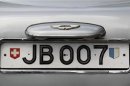 The rotating number plate on the original Aston Martin DB5 driven by actor Sean Connery is displayed in London