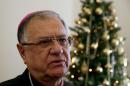The head of the Roman Catholic Church in the Holy Land, the Latin Patriarch of Jerusalem Fuad Twal, speaks during his annual pre-Christmas address at the Latin patriarchate in Jerusalem's old city on December 16, 2015