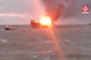A still image from a video footage shows an oil platform on fire in the Caspian Sea