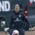 England goalkeeper Joe Hart controls the ball during a team training session in London Colney, north of London