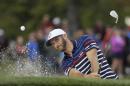 United States' Dustin Johnson hits from a bunker on the 12th hole during a practice round for the Ryder Cup golf tournament Thursday, Sept. 29, 2016, at Hazeltine National Golf Club in Chaska, Minn. (AP Photo/David J. Phillip)